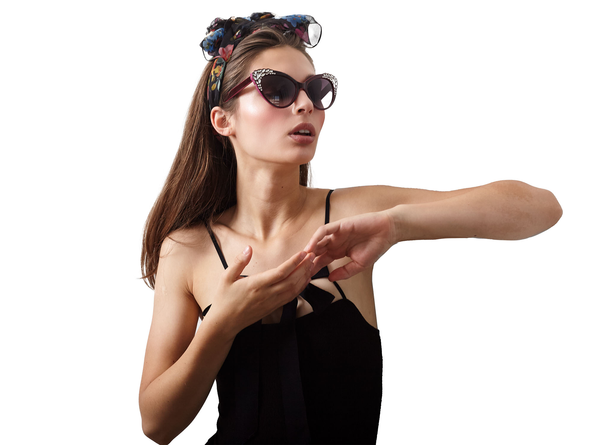 Studio beauty shot of Isabella Scaffidi wearing sunglasses